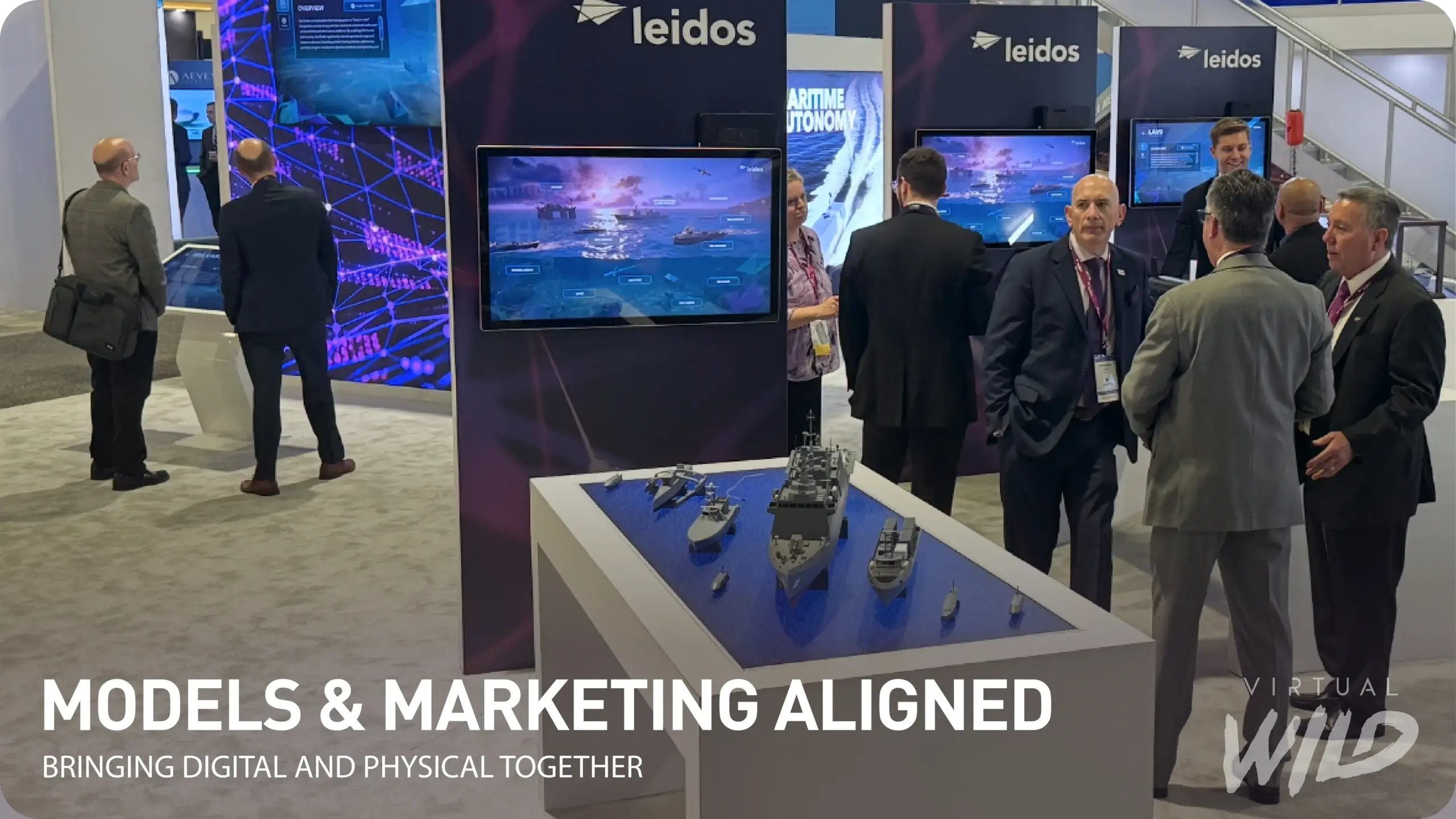 Physical product models and digital marketing aligned at a Leidos booth